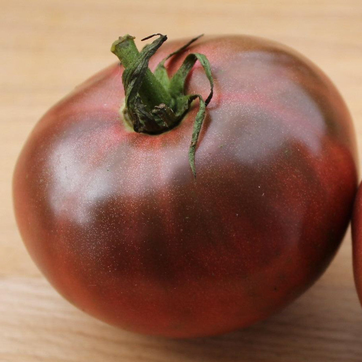 Cherokee Purple heirloom tomatoes with large dusky purple-red fruits